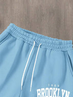 Conjunto Moletom Com Capuz E Estampa Frontal