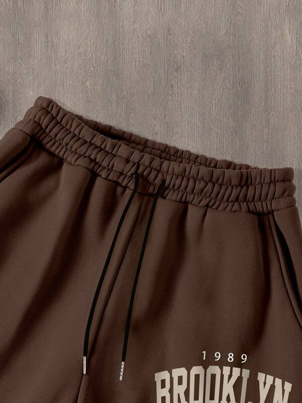 Conjunto Moletom Com Capuz E Estampa Frontal