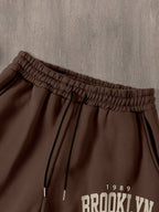 Conjunto Moletom Com Capuz E Estampa Frontal